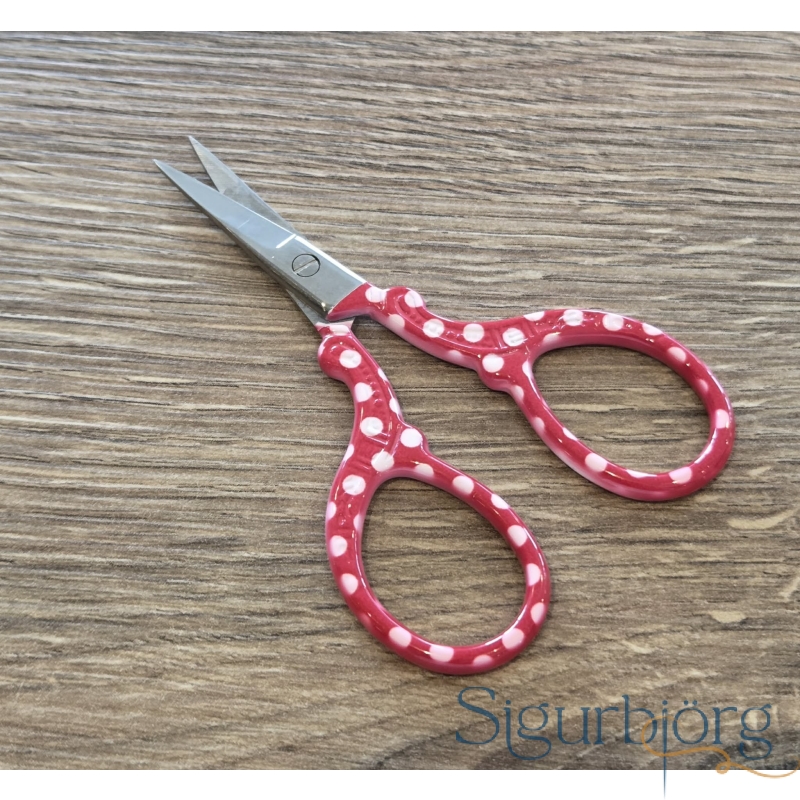 Skæri með rauðu handfangi